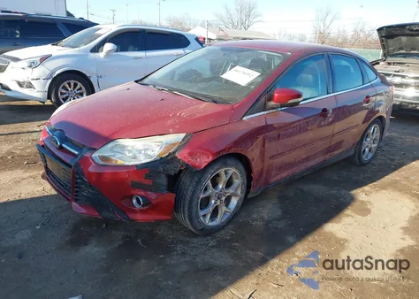 2014 Ford Focus Titanium z USA, uszkodzony, nr VIN 1FADP3J26EL241054